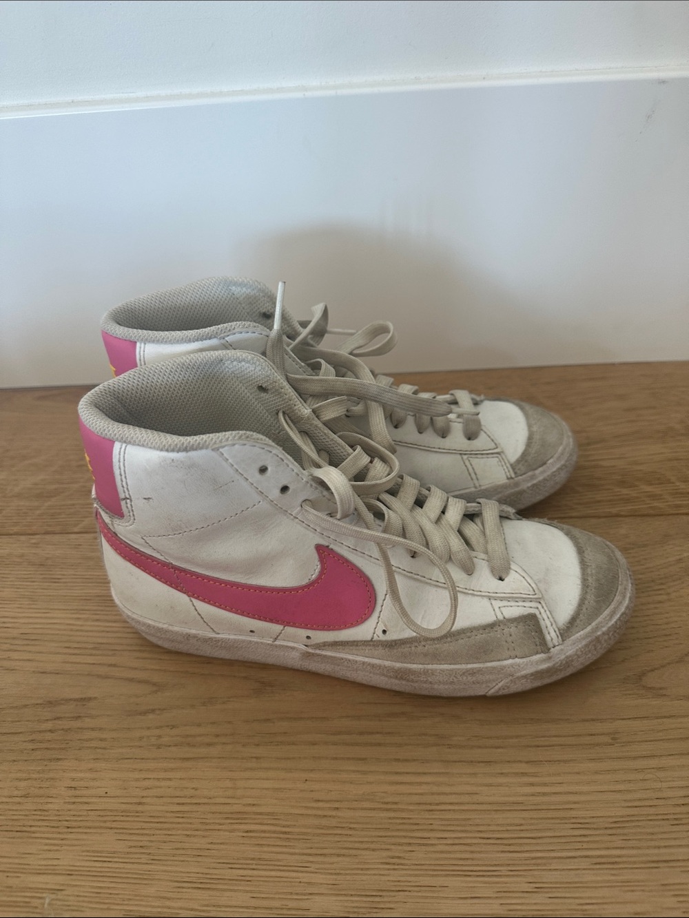 Nike Kids White High-Top Sneakers with Pink Swoosh and Heel 4Y